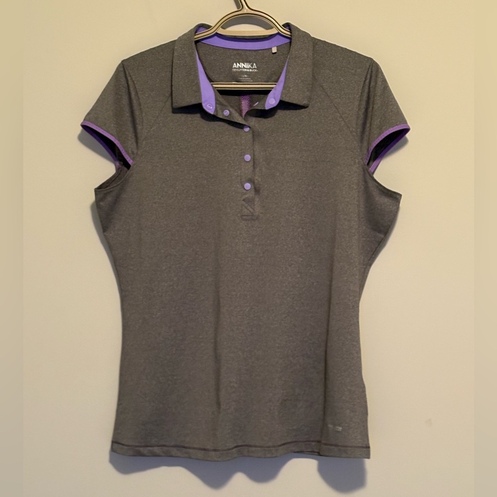 Annika golf shirt. Grey with purple trim. Ladies size L